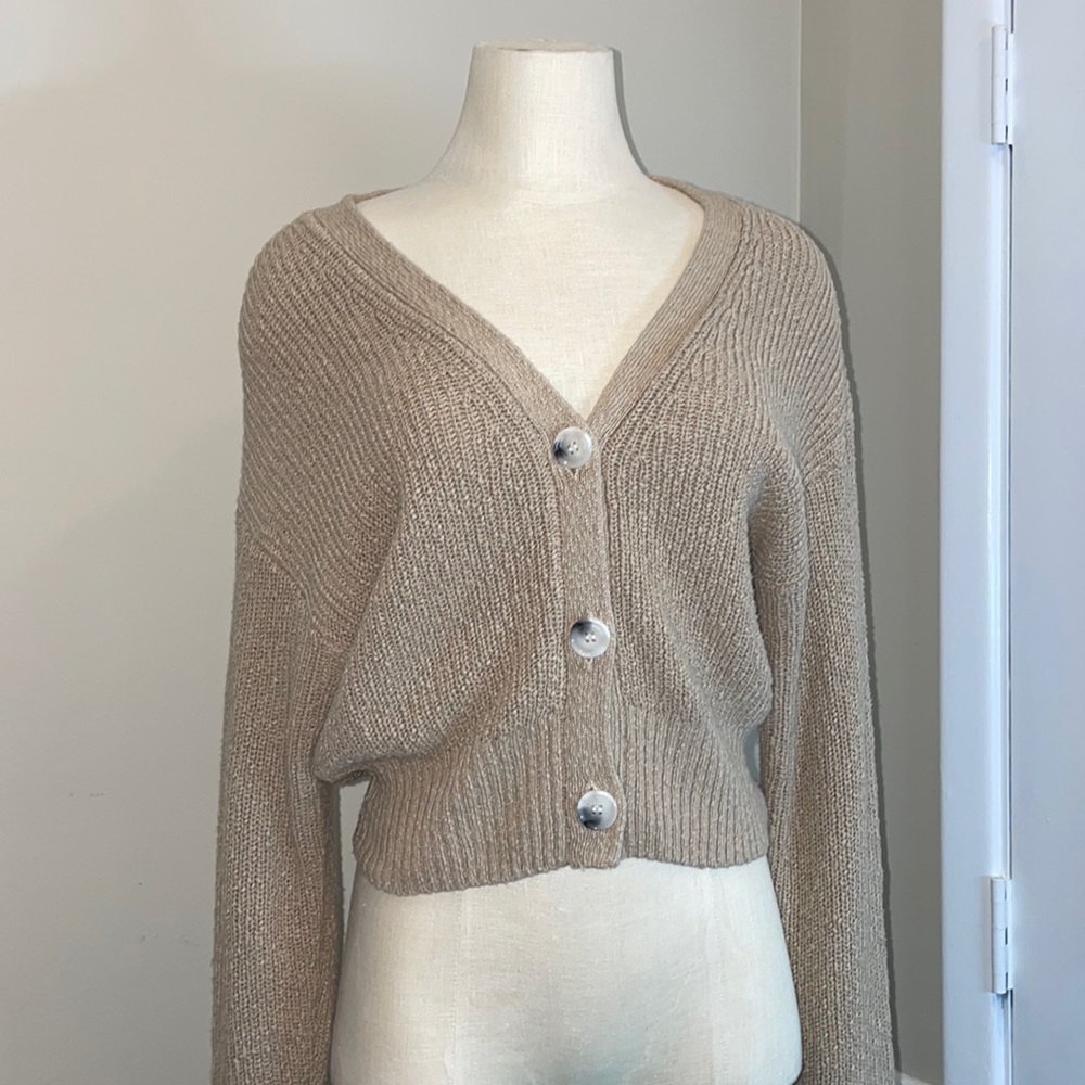 Button up tan cardigan.